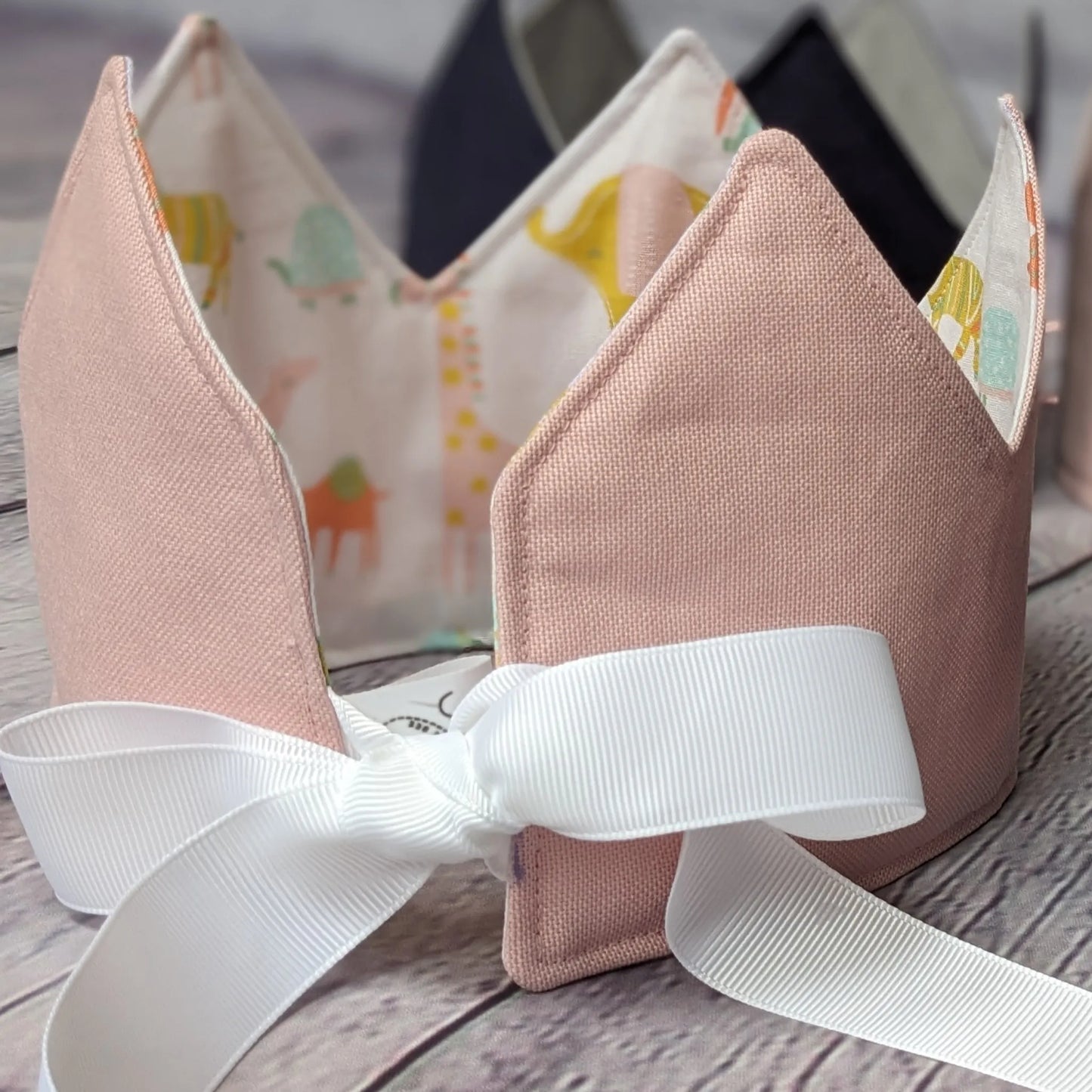 pink-crown-safari-inside-back-with-ribbon-close-up
