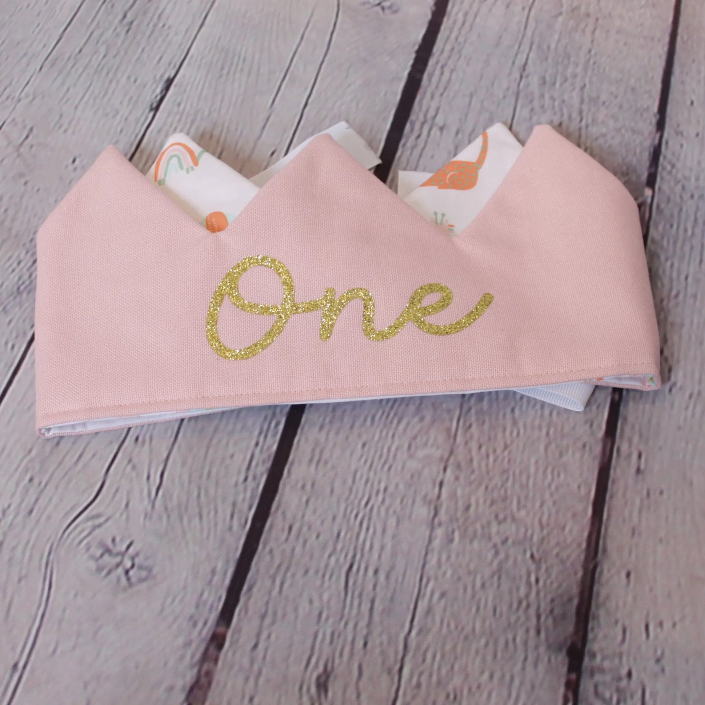 gold-written-number-on-pink-crown