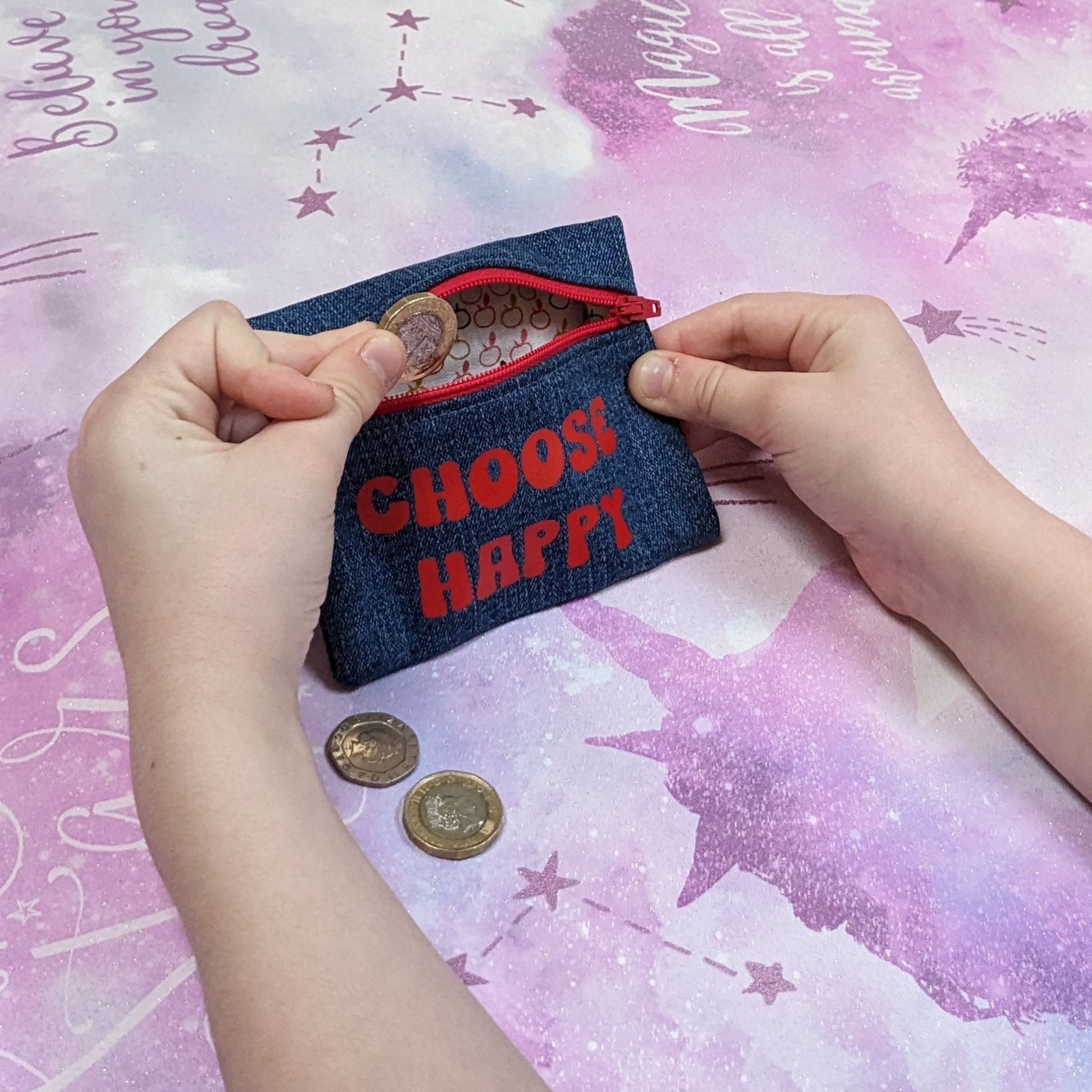 upcycled-denim-coin-purse-in-use-choose-happy-slogan