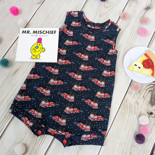 Flatlay-Fire-Engine-Shortie-Romper-book-pretend-food-props