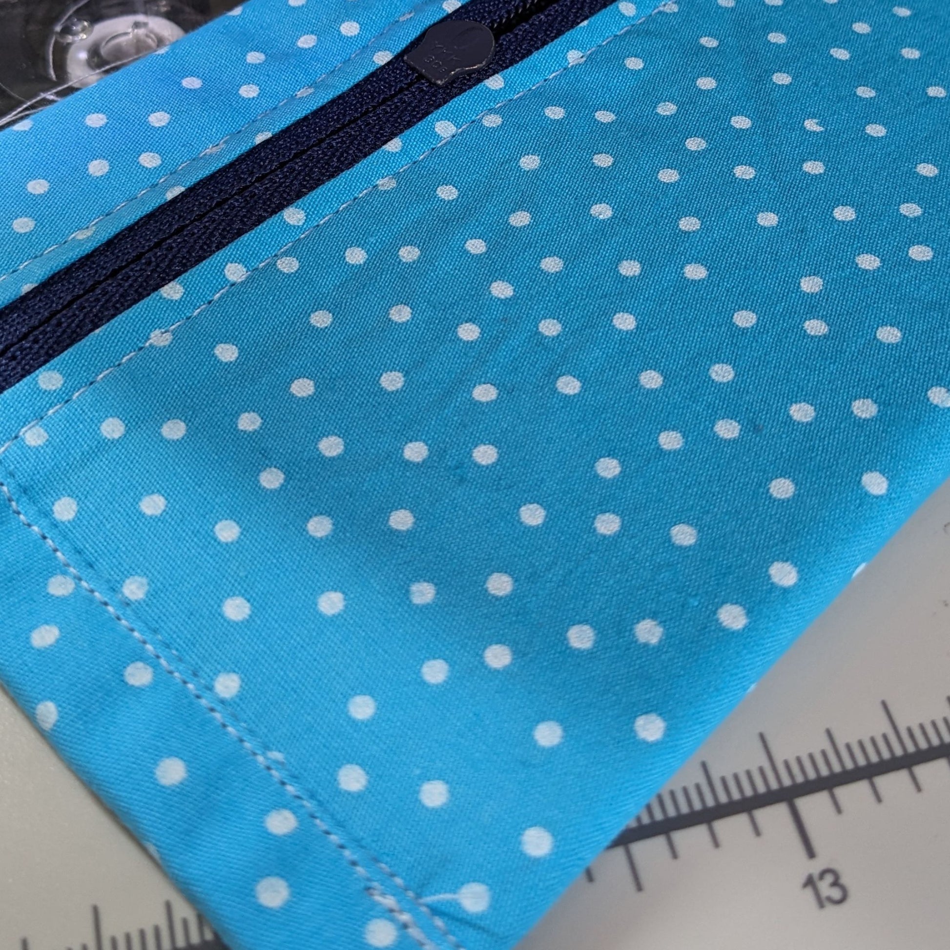 Upcycled-Denim-Coin-Purse-close-up-inside-turquoise-with-white-polka-dots