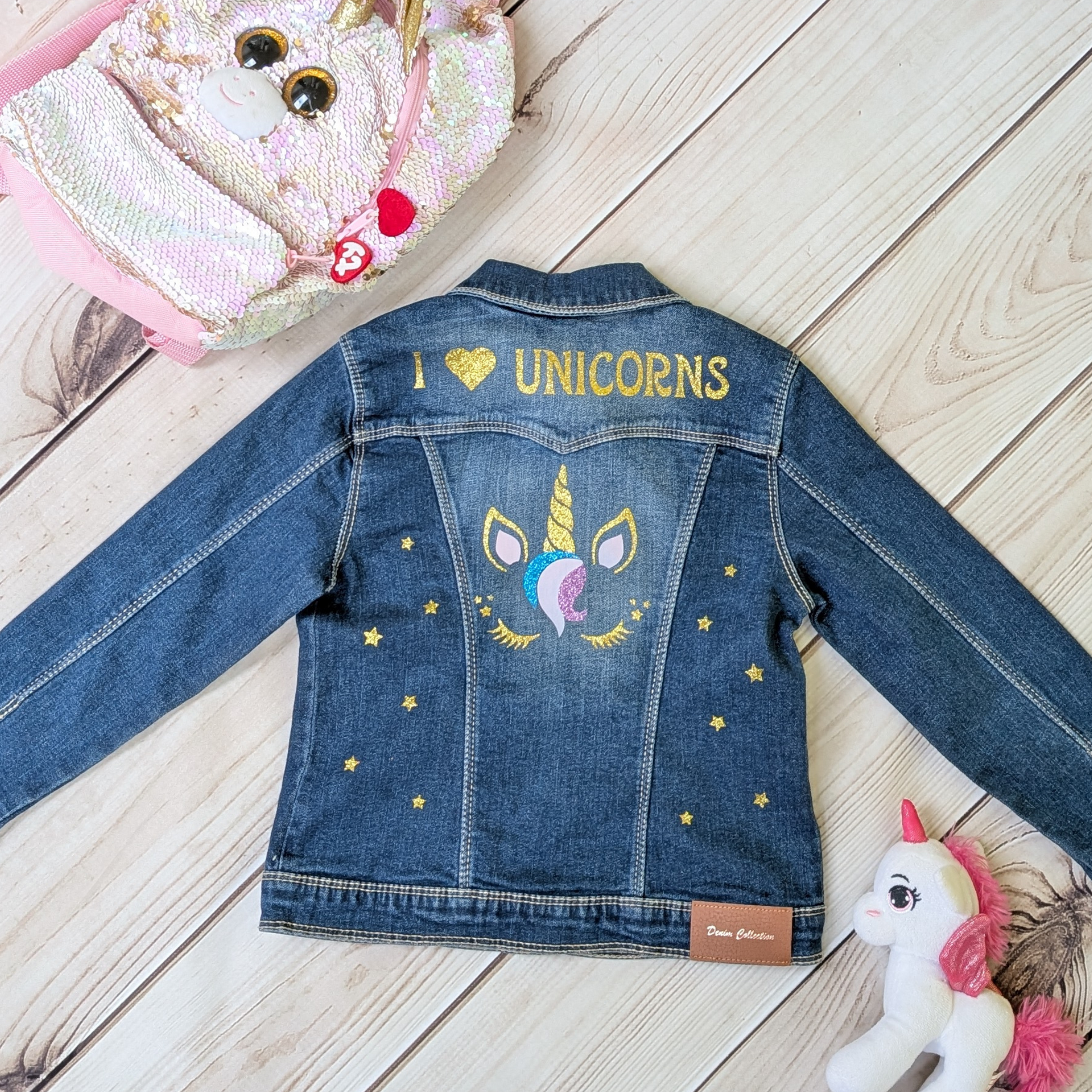 Flatlay-back--denim-jacket-sparkly-i-♥-unicorn-text-unicorn-image-unicorn-props