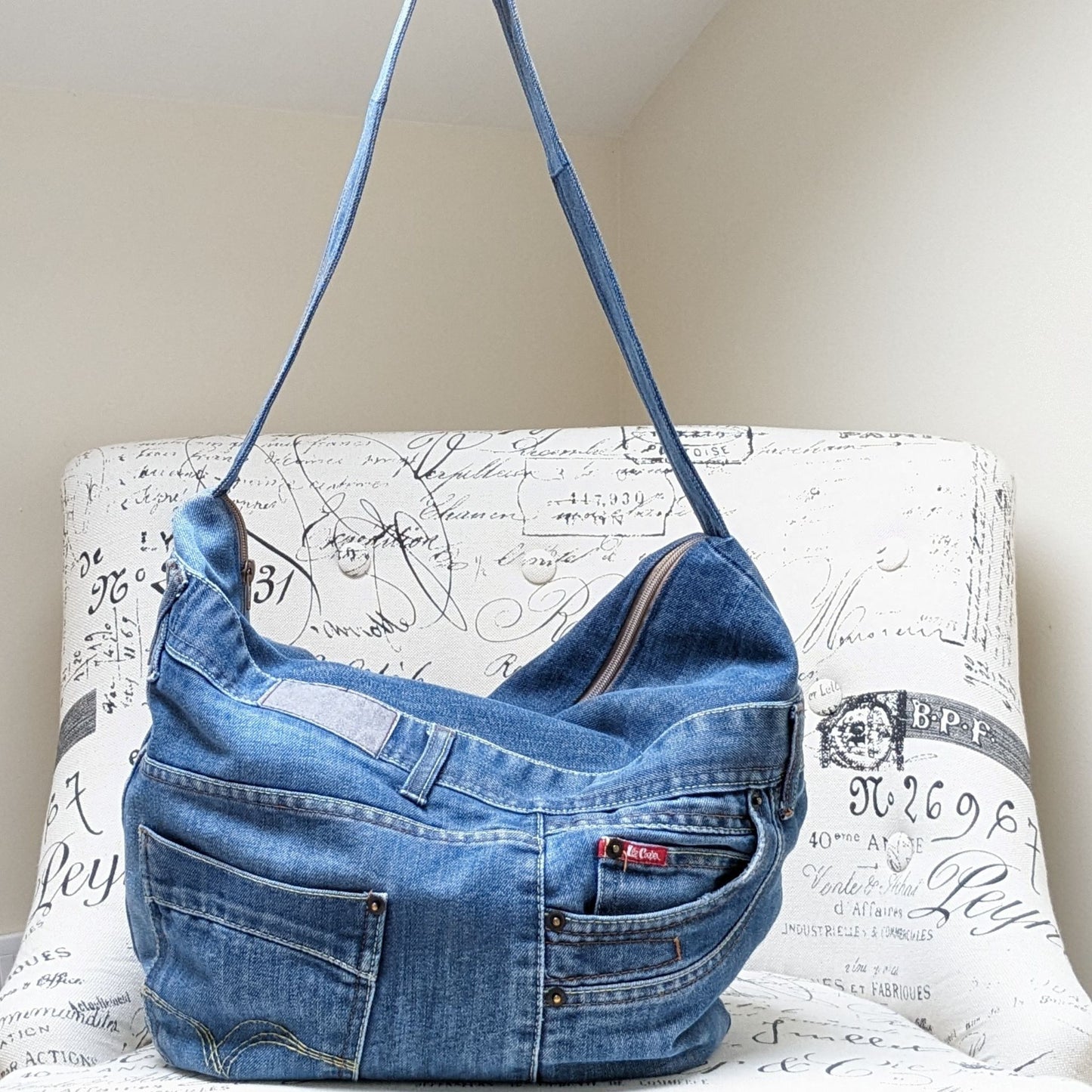 Upcycled-Jeans-Shoulder-Handbag-front-with-usable-pockets