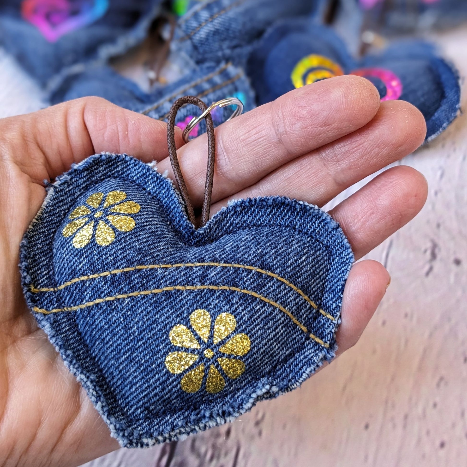 upcycled-denim-keychain-close-up-in-hand