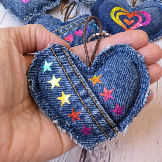 upcycled-heart-shape-keyring-with-holographic-stars-in-palm-of-hand